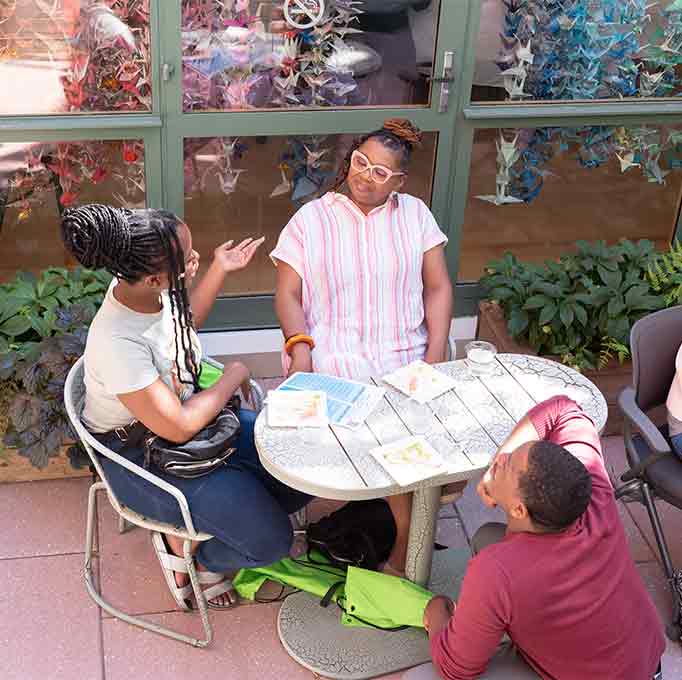 Community gathers in the courtyard at Smith Center